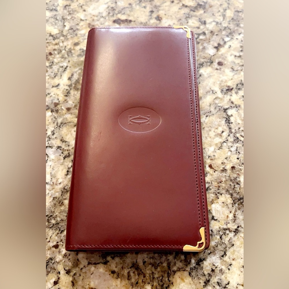 Cartier Authentic EUC Burgundy wallet. Excellent condition. Vintage.No call outs